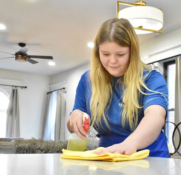woman cleaning a cabin